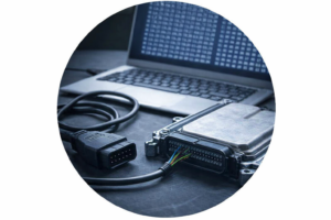 ECU diagnostic setup with laptop and engine control unit for full backup files and binary downloads